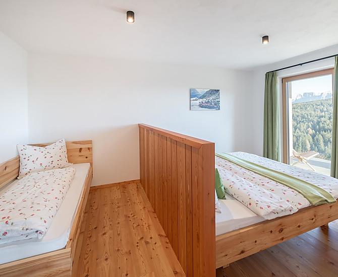 Schlafzimmer in Zirmholz
