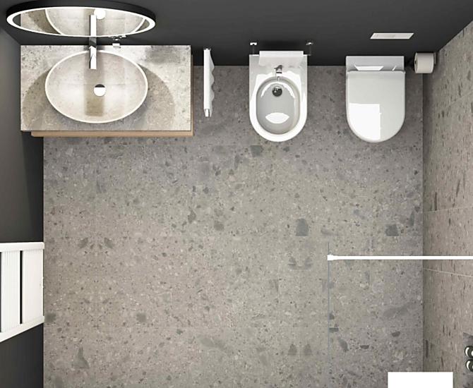 Geräumiges Badezimmer mit offener Dusche, WC, Bidet, Heizkörper und Kosmetikspiegel.