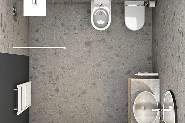 Geräumiges Badezimmer mit offener Dusche, WC, Bidet, Heizkörper und Kosmetikspiegel.
